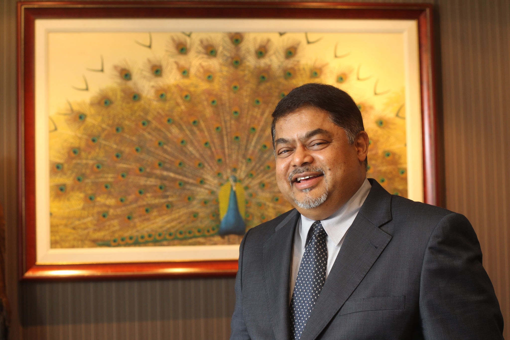 Vijay Eswaran, co-founder and Executive Chairman of the QI Group, poses for a photo in his office at Bank of China Building, Central. 06FEB12 (Photo by K. Y. Cheng/South China Morning Post via Getty Images)